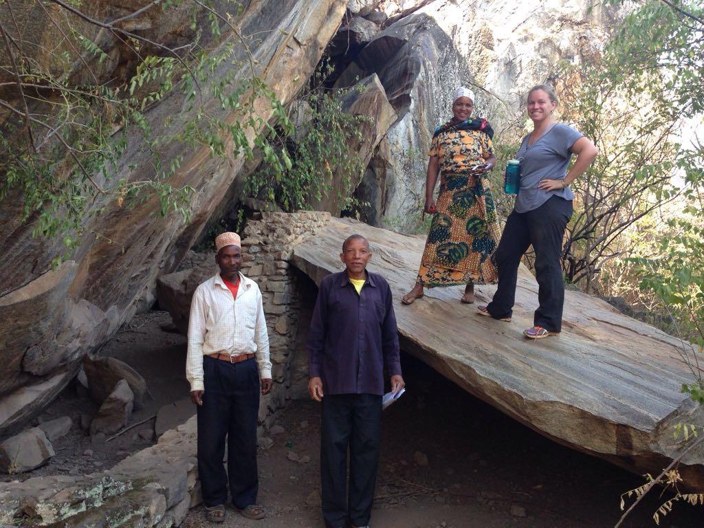 At Kisese II rock shelter with community leaders